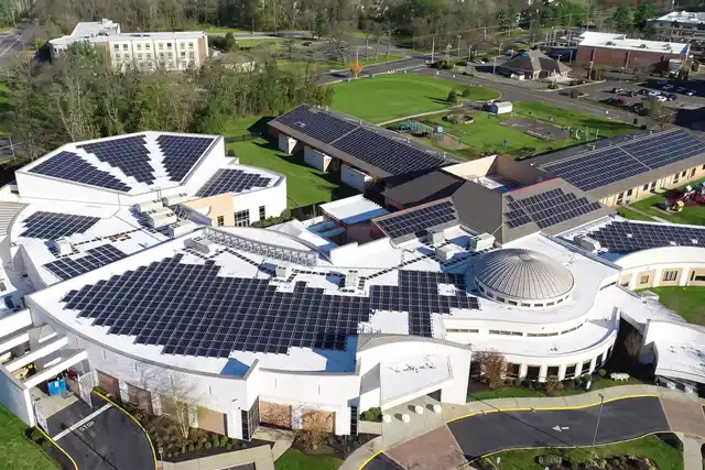 Solar panels on the curved roof of Congregation Beth El in Voorhees Township