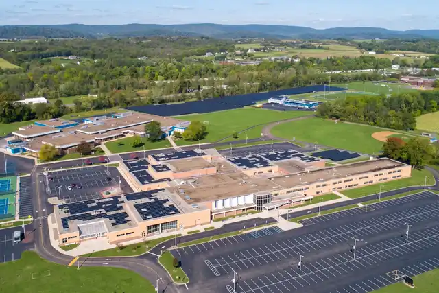 Solar arrays on the roofs and grounds of Central Columbia's high school and middle school