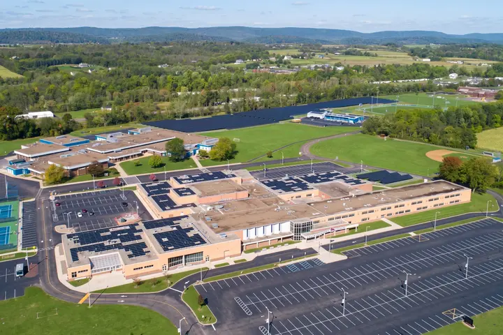 Solar arrays on the roofs and grounds of Central Columbia's high school and middle school