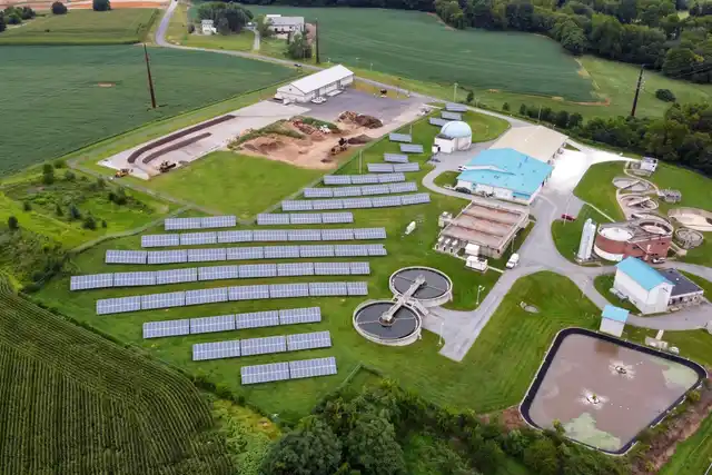 A ground-mounted solar array beside Mount Joy Borough Authority's wastewater treatment tanks