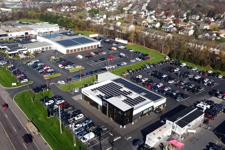 The Freysinger GMC & Hyundai dealership in Mechanicsburg, PA, seen from above, with solar panels on two roofs