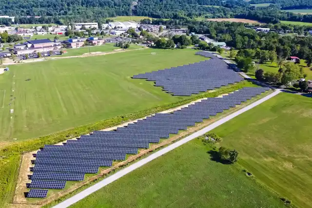 Midd-West School District's ground-mounted solar arrays beside its playing fields in Middleburg, from a drone