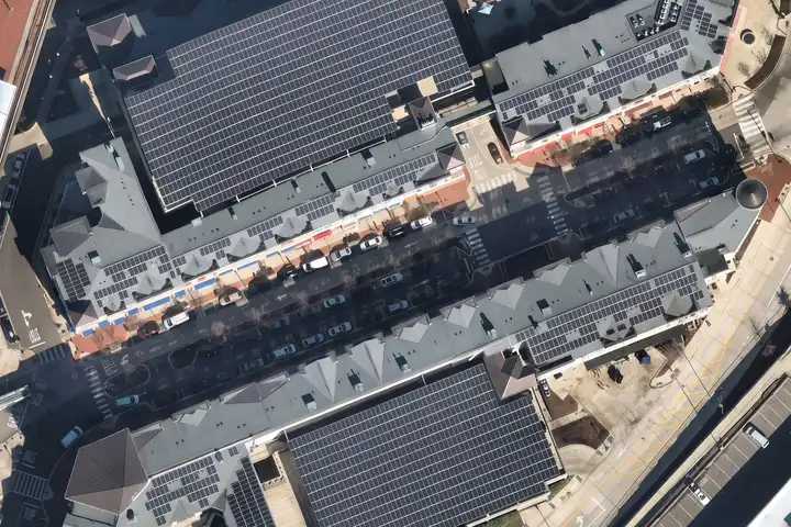 Solar panels covering two parking garages at Rhode Island Row in Washington, D.C., seen from above