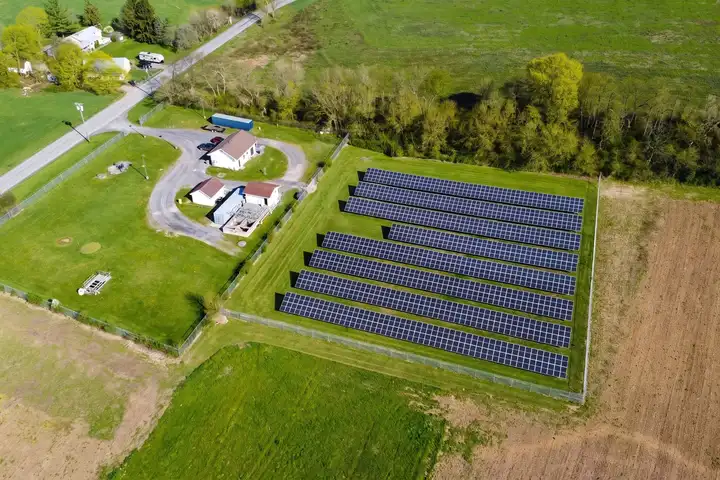 Millheim Borough's ground-mounted solar array beside its sewer plant, from a drone